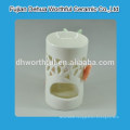 Butterfly series white porcelain oil burner in teapot shape